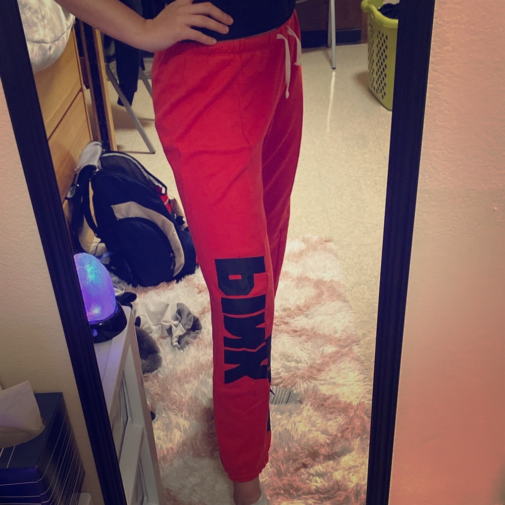 Victoria Secret brand reddish and black sweat